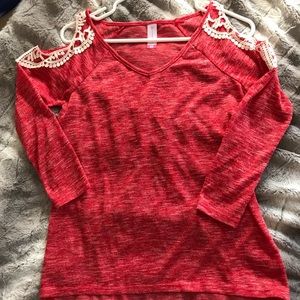 Cold shoulder top with lace detail.